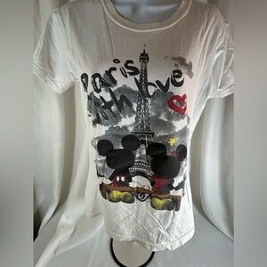 Disney store Mickey and Minnie in Paris, Eiffel Tower, white black gray woman